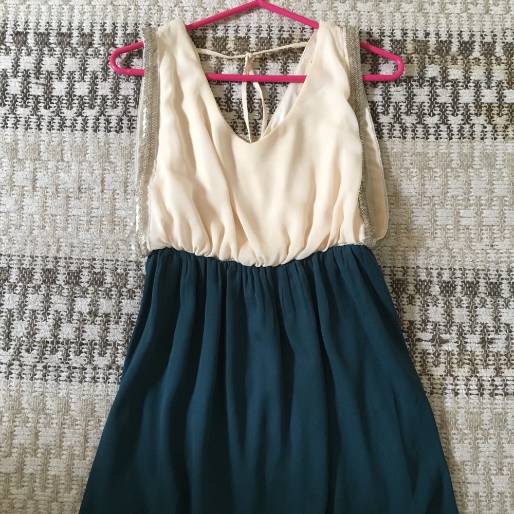 Francesca’s teal and cream dress